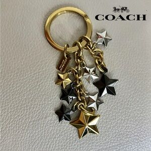 COACH Black and Gold Stars Charm Keychain